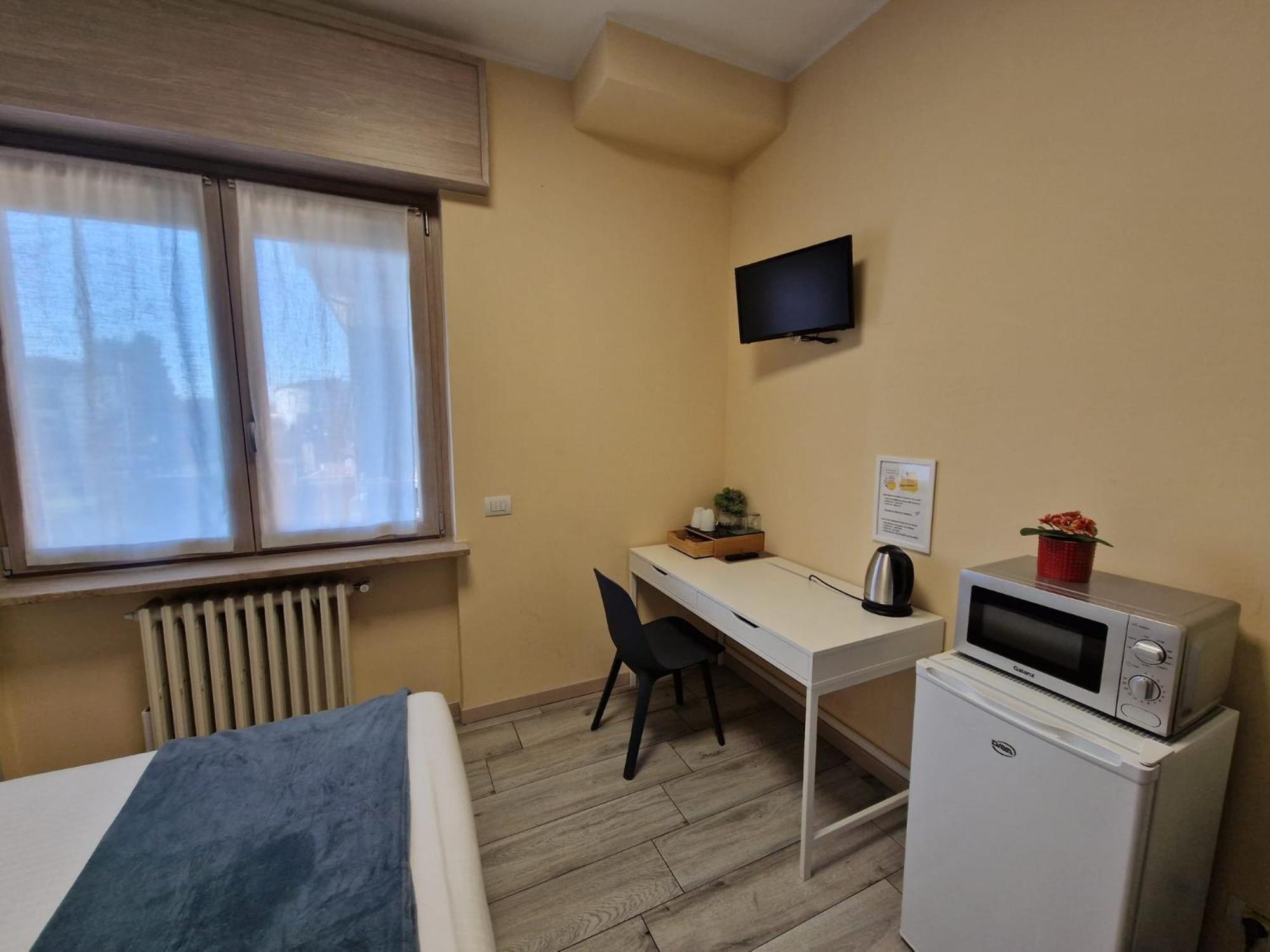 Отель Bgy Airport House Грассоббьо Номер фото